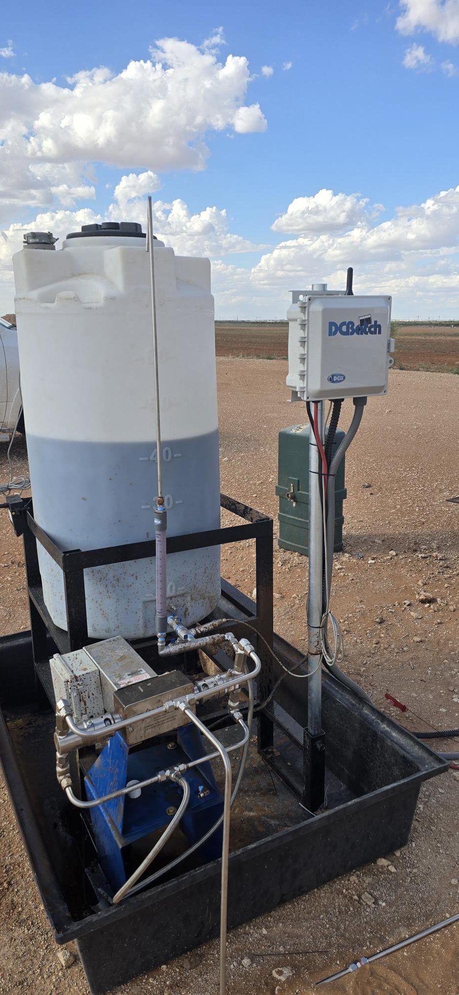 DCBatch system installed beside a chemical storage tank in the field
