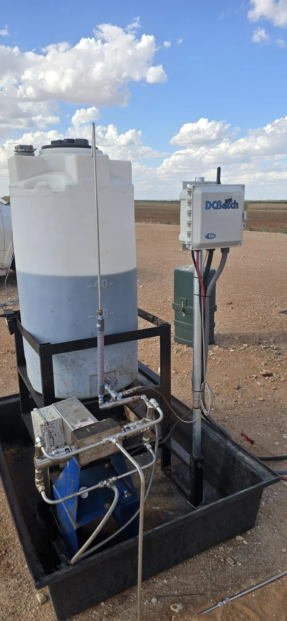 DCBatch system installed beside a chemical storage tank in the field
