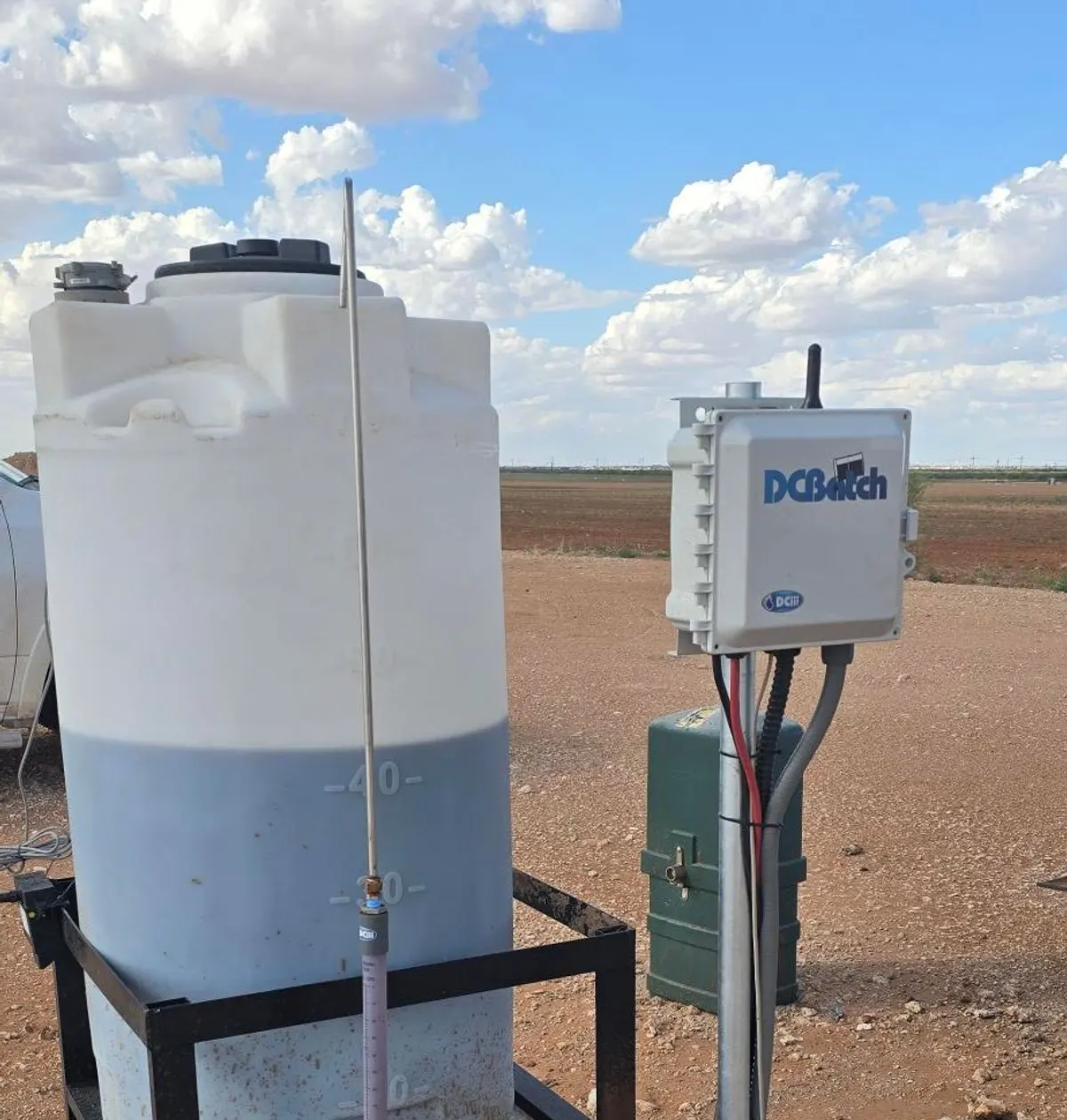 DCBatch controller installed beside a chemical tank in the field
